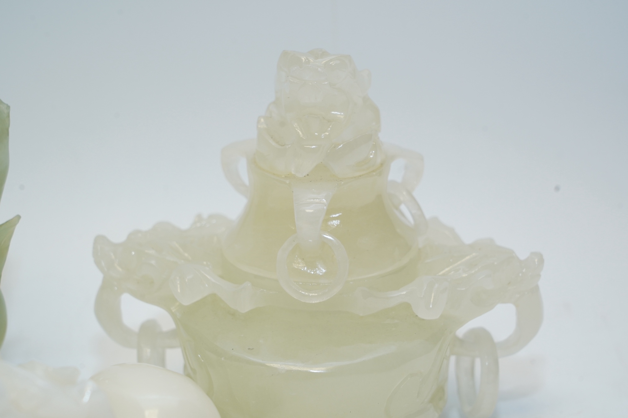 Four Chinese bowenite jade pieces including carving of a bird, largest 20cm. Condition - fair